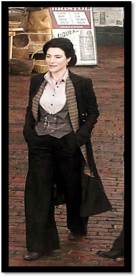 Jaime Murray as the woman who wears trousers