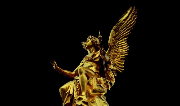 gold angel on black pixabay